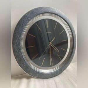 Sunbeam Black Clock with Sparkling Silver Frame and Gold Accents